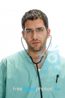 Doctor With Stethoscope In His Ears Stock Photo