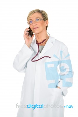 Doctor Woman On The Mobile Phone Stock Photo