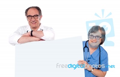 Doctors Showing Blank Board Stock Photo