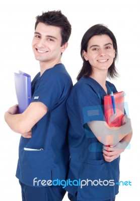 Doctors Team Holding Folders Stock Photo