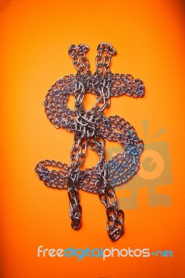 Dollar Chains On Orange Background Stock Image