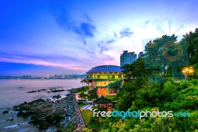 Dongbaek Island With Nurimaru Apec House And Gwangan Bridge At Sunset In Busan,south Korea Stock Photo