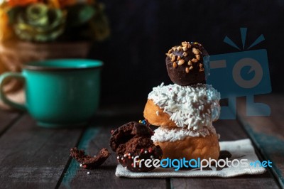 Donuts And Chocolate On The Wooden Stock Photo