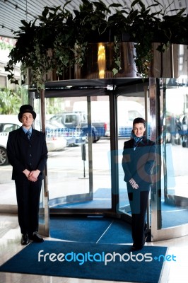 Door Man Receptionist At Entrance Stock Photo