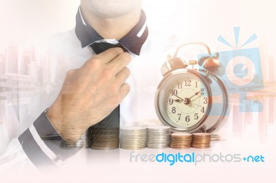 Double Exposure Of Businessman With A Row Of Stack Money Coins Stock Photo