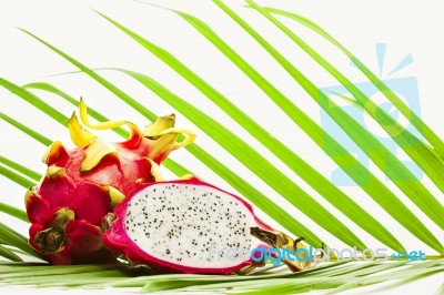 Dragon Fruit On The Palm Leaf Stock Photo