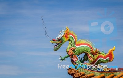 Dragon Sculpture On Roof Of A Chinese Temple Stock Photo