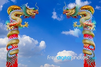 Dragon Statue With The Blue Sky Field Stock Photo