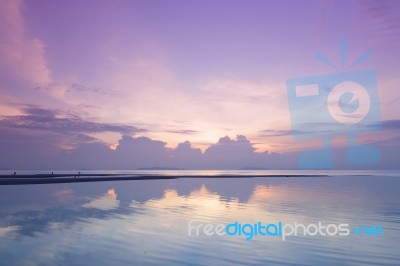 Dramatic Sunset Sky And Tropical Sea At Dusk Stock Photo