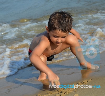 Drawing In The Sand Stock Photo