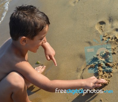 Drawing In The Sand Stock Photo