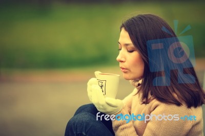 Dreaming Girl With Cup Of Coffee Stock Photo