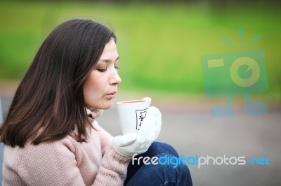 Dreaming Girl With Cup Of Coffee Stock Photo