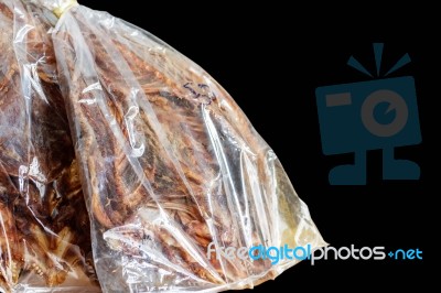 Dried Fish With Black Background Stock Photo