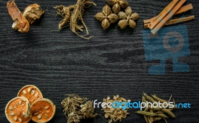 Dried Herbs And Ginseng, Top View Of Thai Herbs And Ginseng On Wooden Floor Stock Photo