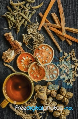 Dried Herbs And Ginseng, Top View Of Thai Herbs And Ginseng On Wooden Floor Stock Photo