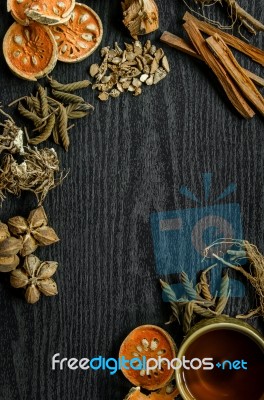 Dried Herbs And Ginseng, Top View Of Thai Herbs And Ginseng On Wooden Floor Stock Photo