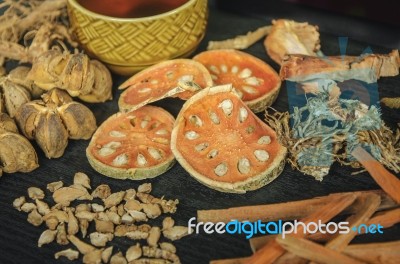 Dried Herbs And Ginseng, Top View Of Thai Herbs And Ginseng On Wooden Floor Stock Photo