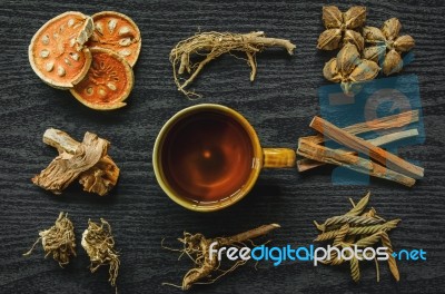 Dried Herbs And Ginseng, Top View Of Thai Herbs And Ginseng On Wooden Floor Stock Photo