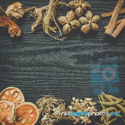 Dried Herbs And Ginseng, Top View Of Thai Herbs And Ginseng On Wooden Floor Stock Photo