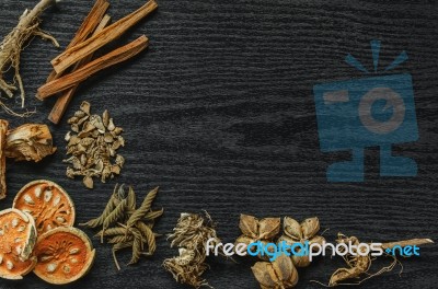 Dried Herbs And Ginseng, Top View Of Thai Herbs And Ginseng On Wooden Floor Stock Photo