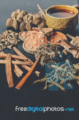 Dried Herbs And Ginseng, Top View Of Thai Herbs And Ginseng On Wooden Floor Stock Photo