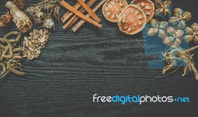 Dried Herbs And Ginseng, Top View Of Thai Herbs And Ginseng On Wooden Floor Stock Photo