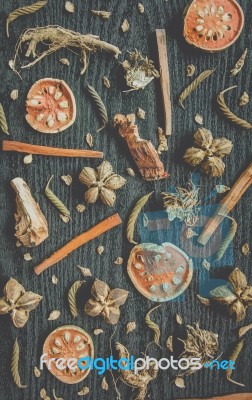 Dried Herbs And Ginseng, Top View Of Thai Herbs And Ginseng On Wooden Floor Stock Photo