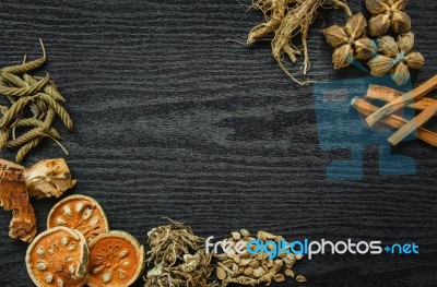 Dried Herbs And Ginseng, Top View Of Thai Herbs And Ginseng On Wooden Floor Stock Photo