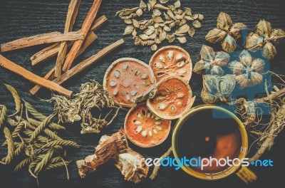 Dried Herbs And Ginseng, Top View Of Thai Herbs And Ginseng On Wooden Floor Stock Photo