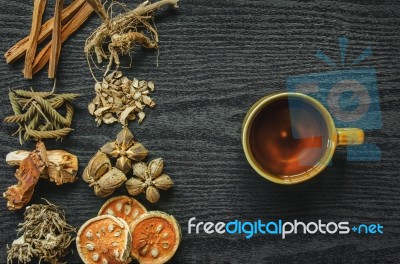 Dried Herbs And Ginseng, Top View Of Thai Herbs And Ginseng On Wooden Floor Stock Photo