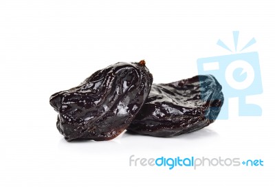 Dried Prune Isolated On The White Background Stock Photo