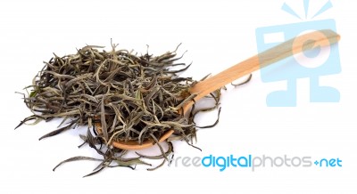 Dried White Tea Leaf With Wooden Spoon Isolated Stock Photo