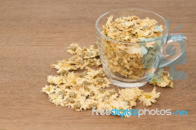 Dried Yellow Chrysanthemum , Flower Tea In Glass Stock Photo