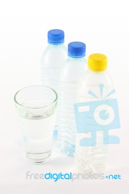 Drinking Water In Bottle And Glass Stock Photo