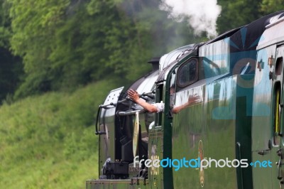 Driver Waving Goodbye Stock Photo