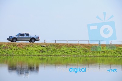 Driving On The Water Front Road Stock Photo