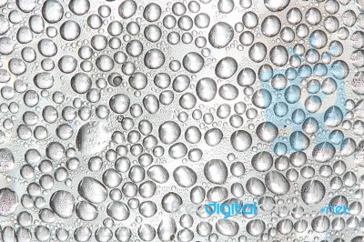 Drop Of Water On Glass Surface Stock Photo