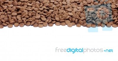 Dry Brown Pet Food (dog Or Cat) On White Background Stock Photo