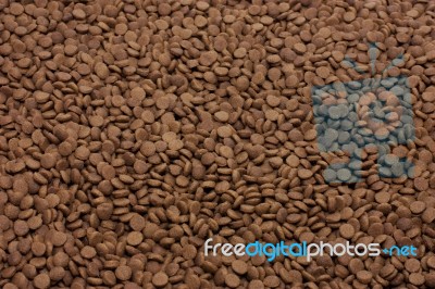 Dry Pet Food (dog Or Cat) Brown Background Stock Photo