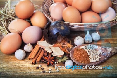 Dry Spice Herb And Fresh Egg On Wood Table Stock Photo