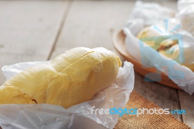 Durian Pieces On Wooden Stock Photo