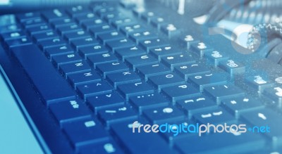 Dusty Keyboard In Blue Light Stock Photo