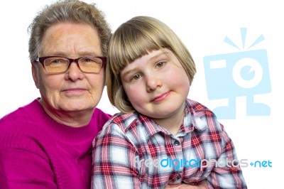 Dutch Granddaughter Sitting On Lap Of Grandmother Stock Photo