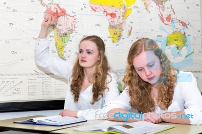 Dutch Teenage Girl With Learn Finger In Geography Lesson Stock Photo