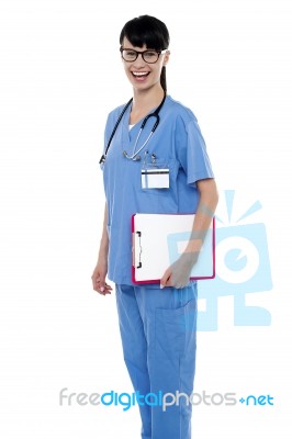 Duty Doctor Posing With Case Sheet In Hand Stock Photo