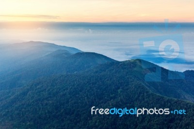 Early Morning Foggy  Sunrise On  Top Of Mountain Soft Focus Grai… Stock Photo