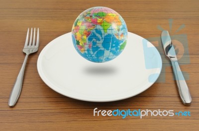 Earth On Plate, Ready For Eat Stock Photo