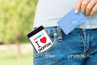 Easy Shopping Online Everywhere With Phone And Credit Card Stock Photo