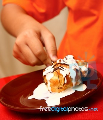 Eating Cream Cake Stock Photo